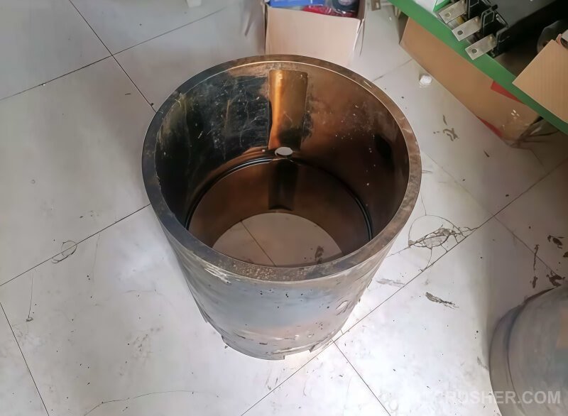 Worn old eccentric bushing removed from Metso HP500 cone crusher